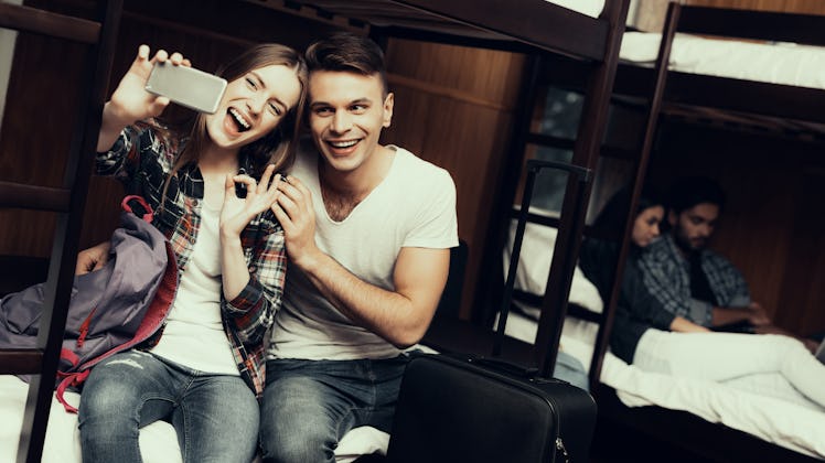 Hostel for Young People. Best Friends Traveling. Small Room in Hostel. spend time Together. bunk bed...