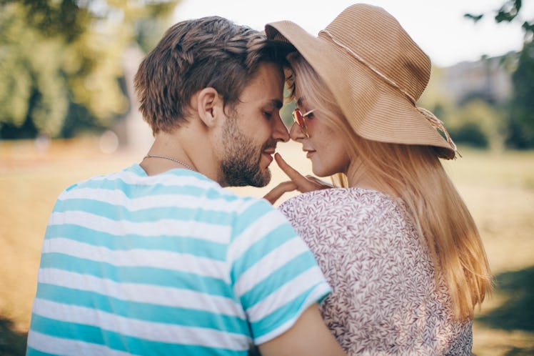 Couple in love. Couple love. Man and woman nature. Kissing love.