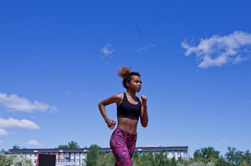 Female Sprinter Getting Ready to Start The Race