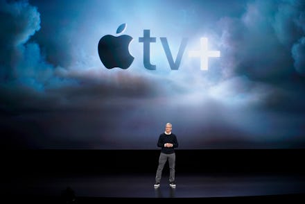 Apple CEO Tim Cook speaks at the Steve Jobs Theater during an event to announce new products, in Cup...