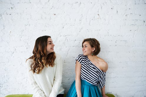 People, youth, happiness, joy and friendship. Two happy beautiful European young women friends or si...