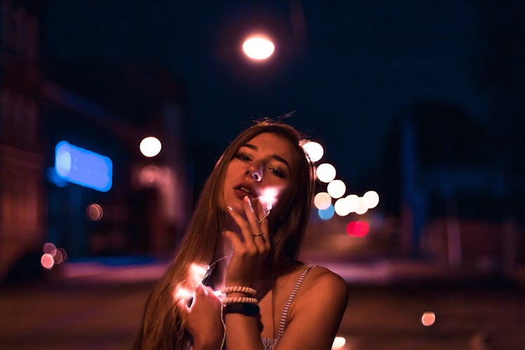 beautiful girl on the night street of the city