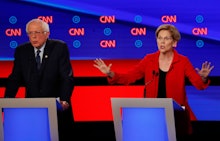 Sen. Bernie Sanders, I-Vt., and Sen. Elizabeth Warren, D-Mass., participate in the first of two Demo...