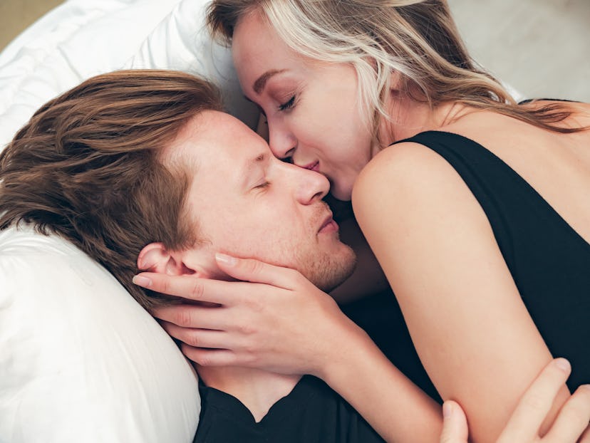 romantic couple feeling loving on bed in bedroom, People lifestyles concept.