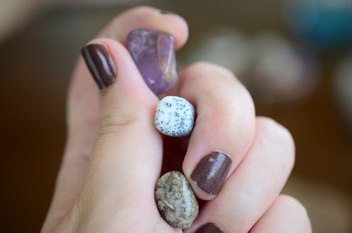 Amethyst, Dendritic Agate, and Ocean Jasper. Small sized crystal bundle. Woman's hand holding healin...