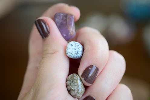 Amethyst, Dendritic Agate, and Ocean Jasper. Small sized crystal bundle. Woman's hand holding healin...