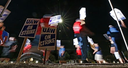Members of the United Autoworkers (UAW) picket outside the General Motors (GM) plant in Arlington, T...