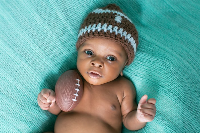 Newborn Baby Boy with Football
