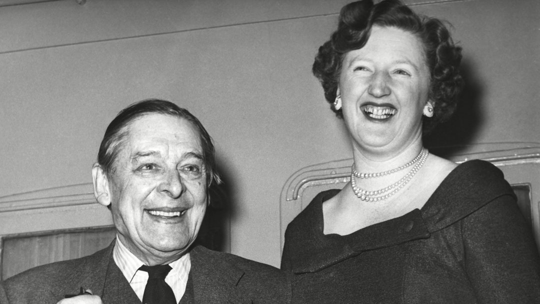 Poet Thomas Stearns Eliot with wife Valerie in New York en route to a vacation in Nassau around
