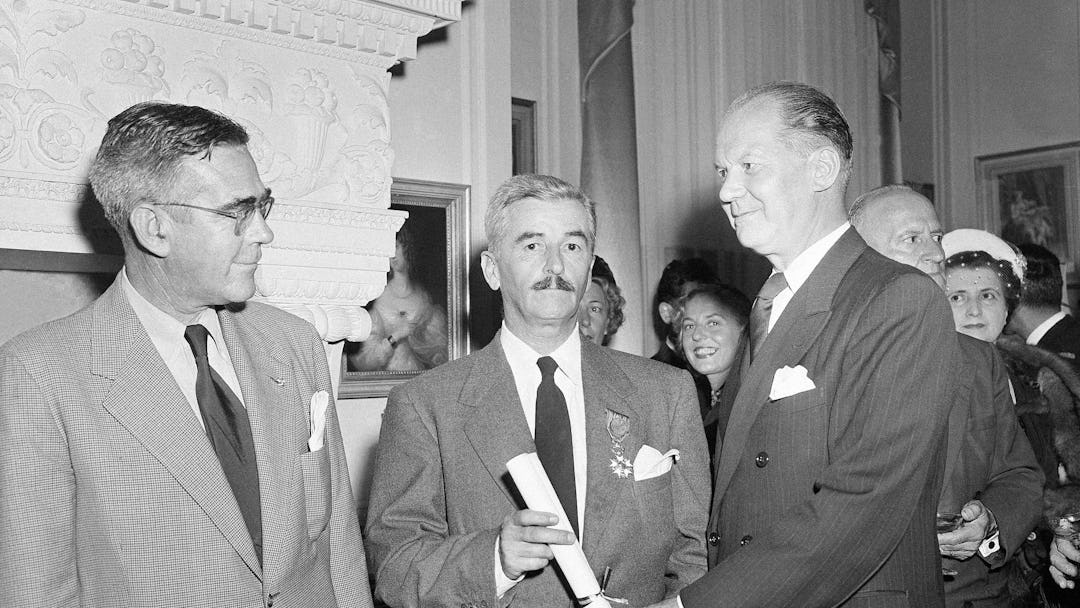 William Faulkner From left to right are F. G. Strachan, Censul of Sweden; William Faulkner, of Oxfor...