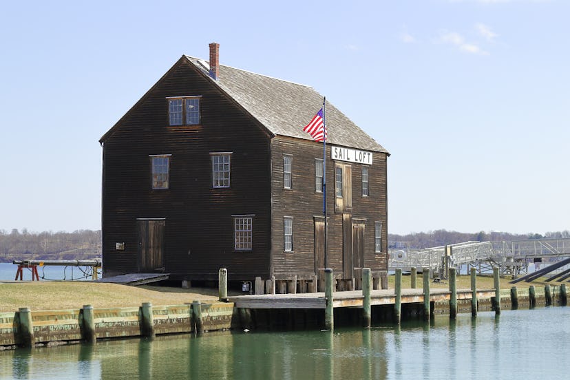 View of historic pier and timber sail loft building in Salem, Massachusetts