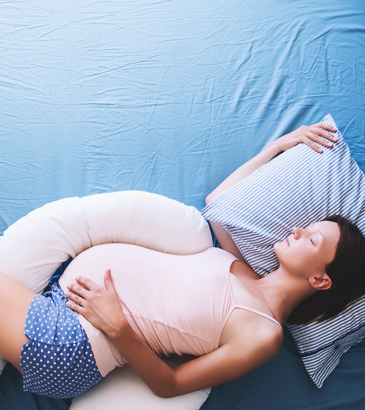 Beautiful pregnant woman relaxing or sleeping  in an article about can you go into labor while sleep...