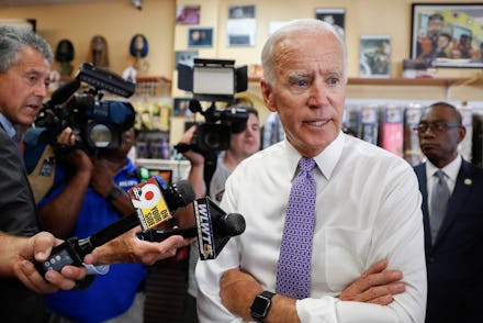 Former Vice President Joe Biden speaks to the media during a campaign stop with Democratic gubernato...