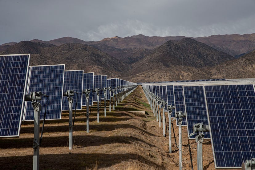Solar panels stand in the Quilapilún photovoltaic plant, a joint venture by Chile and China, in Coli...
