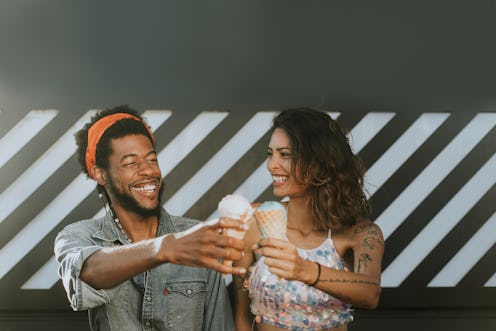 Cheerful couple enjoying ice cream