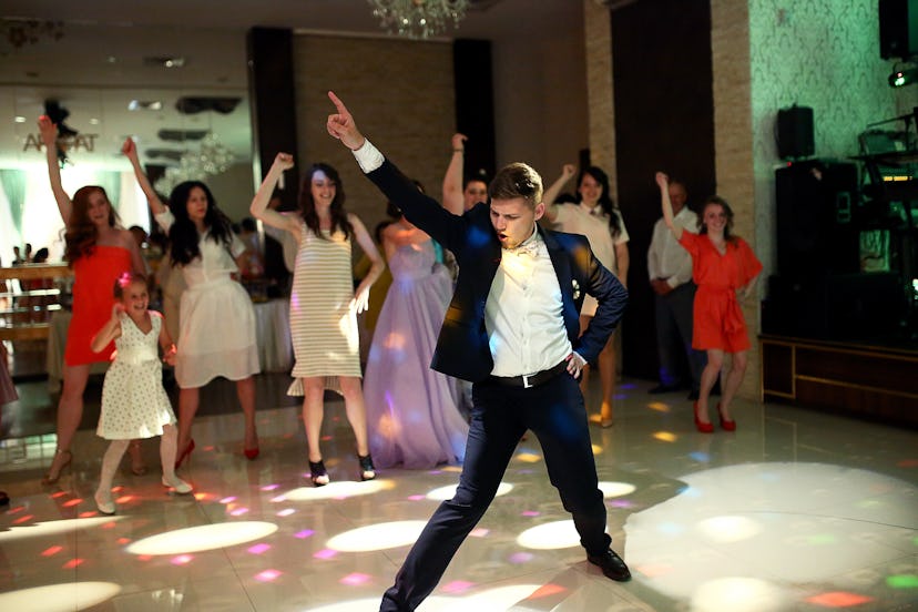 The groom dancing on the dancefloor