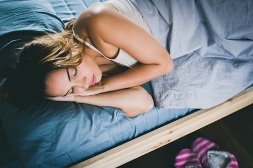 Woman sleeping at home