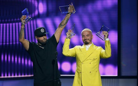 Nicky Jam, J Balvin. Nicky Jam, left, and J Balvin accept the award for airplay song of the year for...