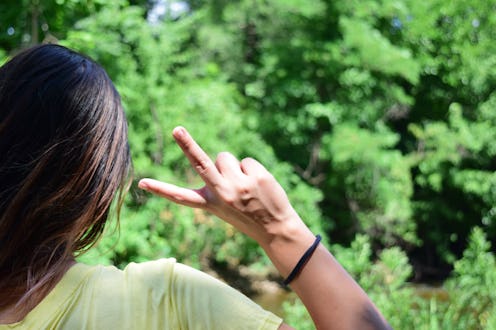 Peace Sign Girl in Nature