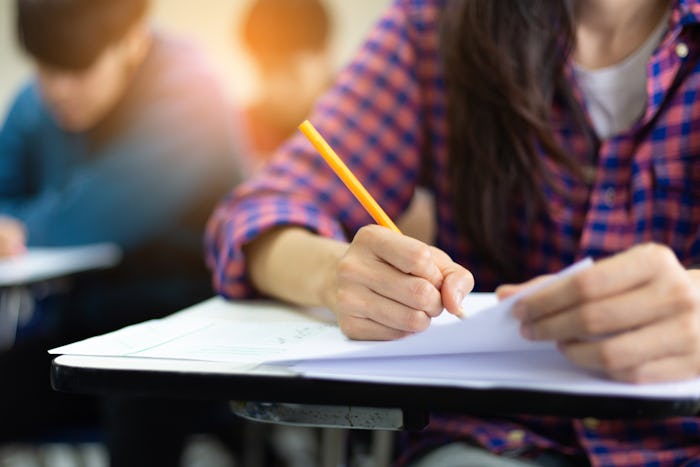 high school,university student study.hands holding pencil writing paper answer sheet.sitting lecture...