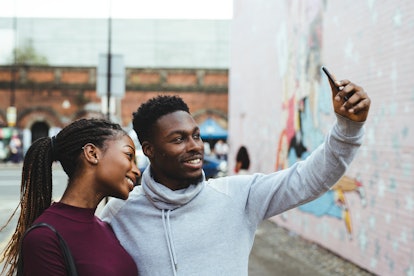 Couple taking a selfie in London