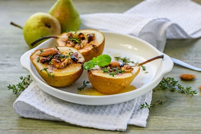 Baked pears with nuts (walnuts, almonds), honey and cinnamon.