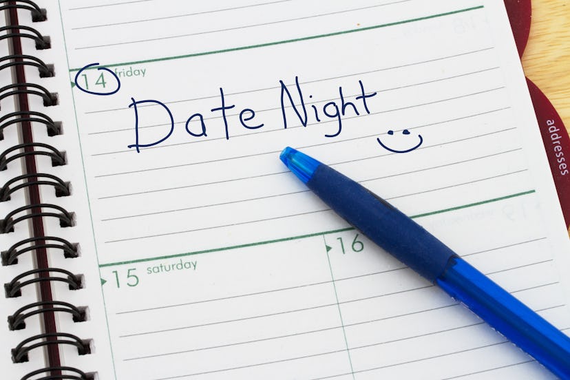 Planning your Date Night, A day blank day planner with a blue pen