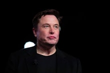 Tesla CEO Elon Musk pauses while speaking before unveiling the Model Y at the company's design studi...