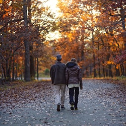 Romantic couple on fall background