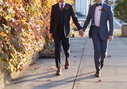 Gay Grooms Walking Together on Wedding Day in Fall
