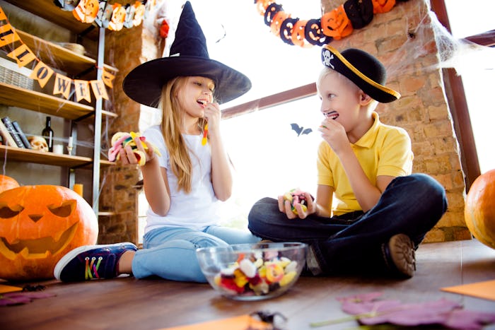 Experts say letting kids enjoy their Halloween candy is better for them than trying to keep sweets a...