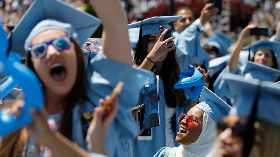 Nehad Abdelgadir, right, cheers with fellow Barnard College students as they participate in Columbia...