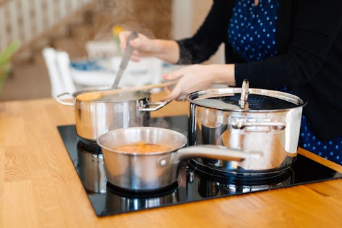 Woman making organic  lunch in modern kitchen