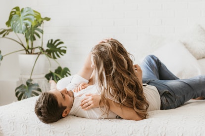 Lifestyle. Beautiful couple in bed