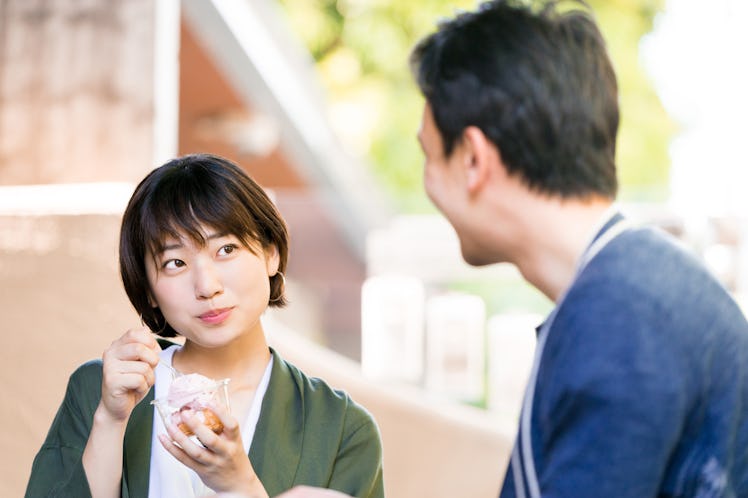 Woman eating ice cream (a date couple)