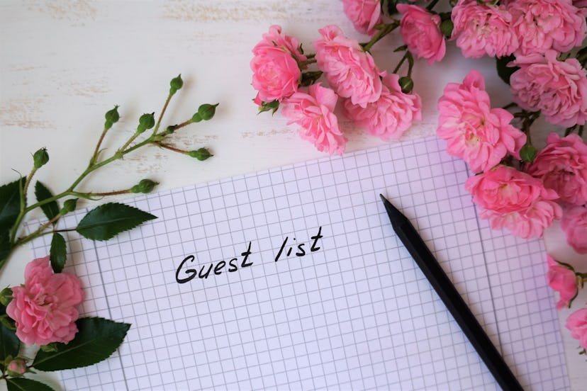 Guest list with small roses covered