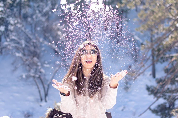 girl having fun in the snow