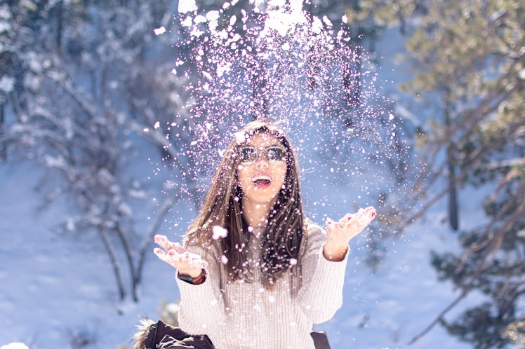 girl having fun in the snow