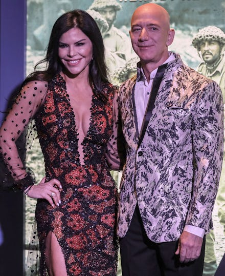 Amazon Founder and CEO Jeff Bezos (R) and his partner, US new anchor Lauren Sanchez (L), poses for p...