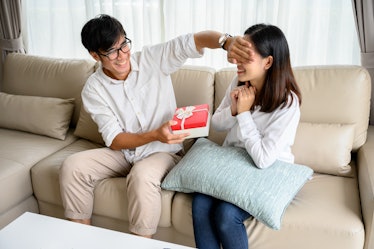 man giving present to woman on special day