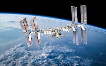 International space station on orbit of Earth planet. ISS. Dark background. Elements of this image f...