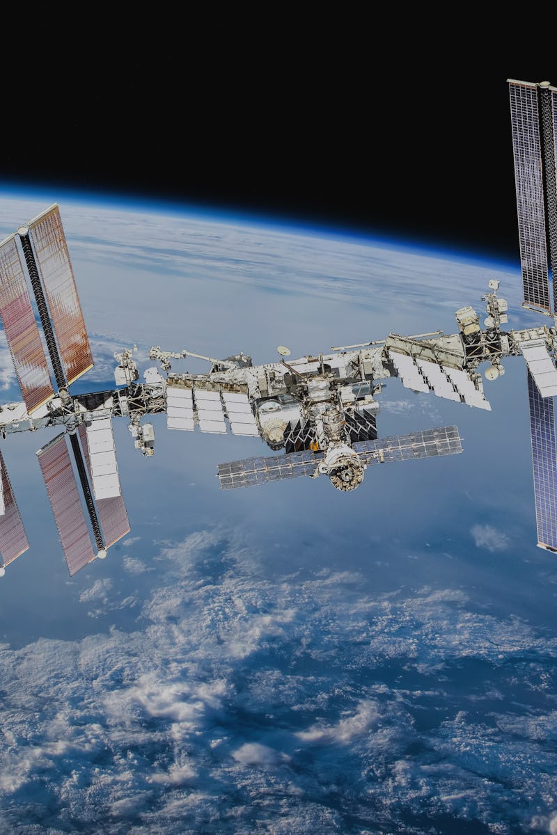 International space station on orbit of Earth planet. ISS. Dark background. Elements of this image f...