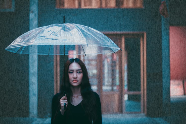 Portrait charming beautiful woman. Attractive beautiful woman is looking at walking street. Gorgeous...