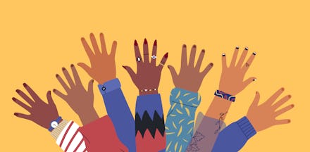 Diverse young people hands on isolated background. Teenager hand group with raised arm for celebrati...