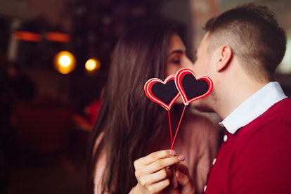 Valentine's Day concept. Happy couple in love with. A young loving couple celebrating Valentine's Da...