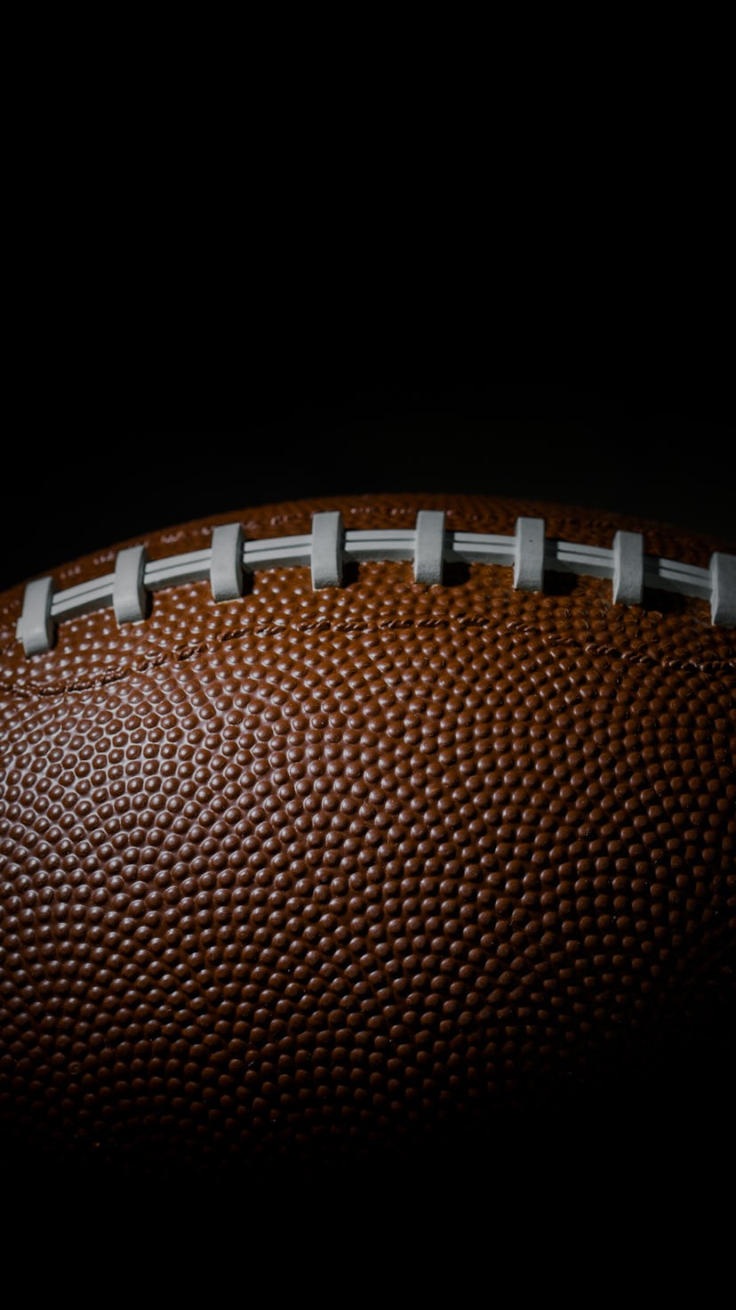 American football on dark background. Super bowl