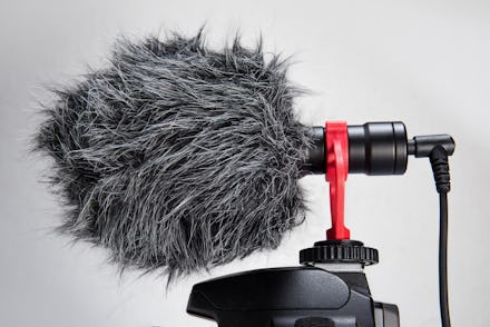 Professional Cardioid Directional Condenser Video Microphone black color attach on DSRL camera isola...