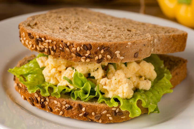 Egg salad sandwich with whole grain bread. Close up, selective focus