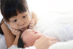 Pediatricians don't recommend keeping babies totally away from sick siblings, but do suggest some sp...