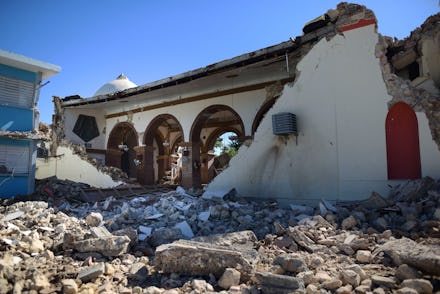 The Immaculate Concepcion Catholic church lies in ruins after an overnight earthquake in Guayanilla,...